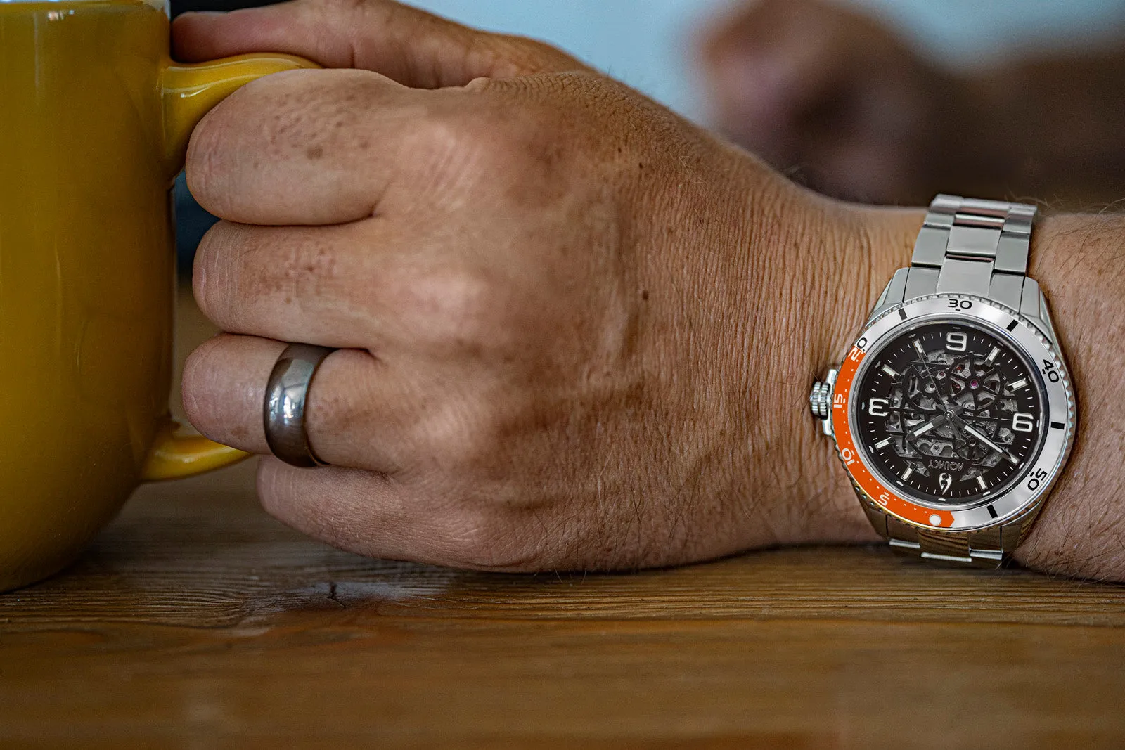 Aquacy Hei Matau Skeleton Watch 200M Black Dial Orange/Silver Bezel Men's Automatic