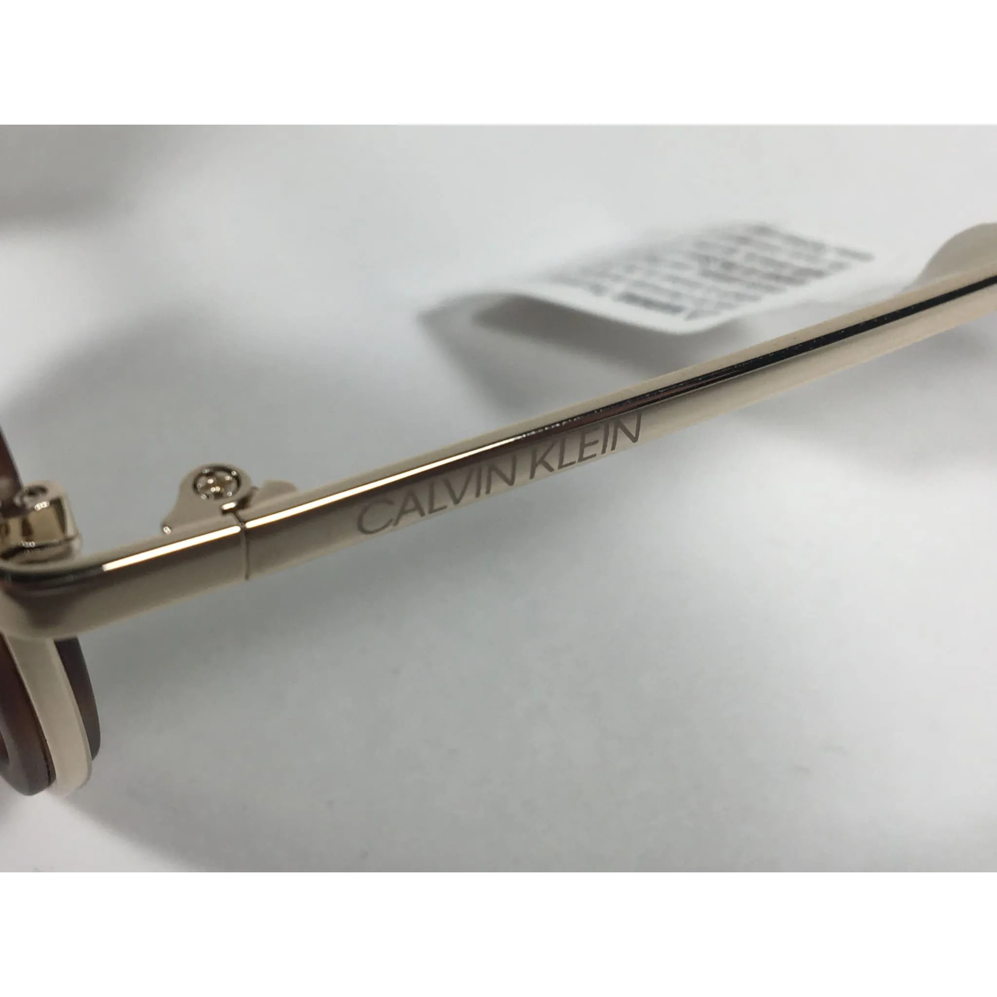 Calvin Klein CK19131S 240 Round Sunglasses Gold and Havana Green Lens