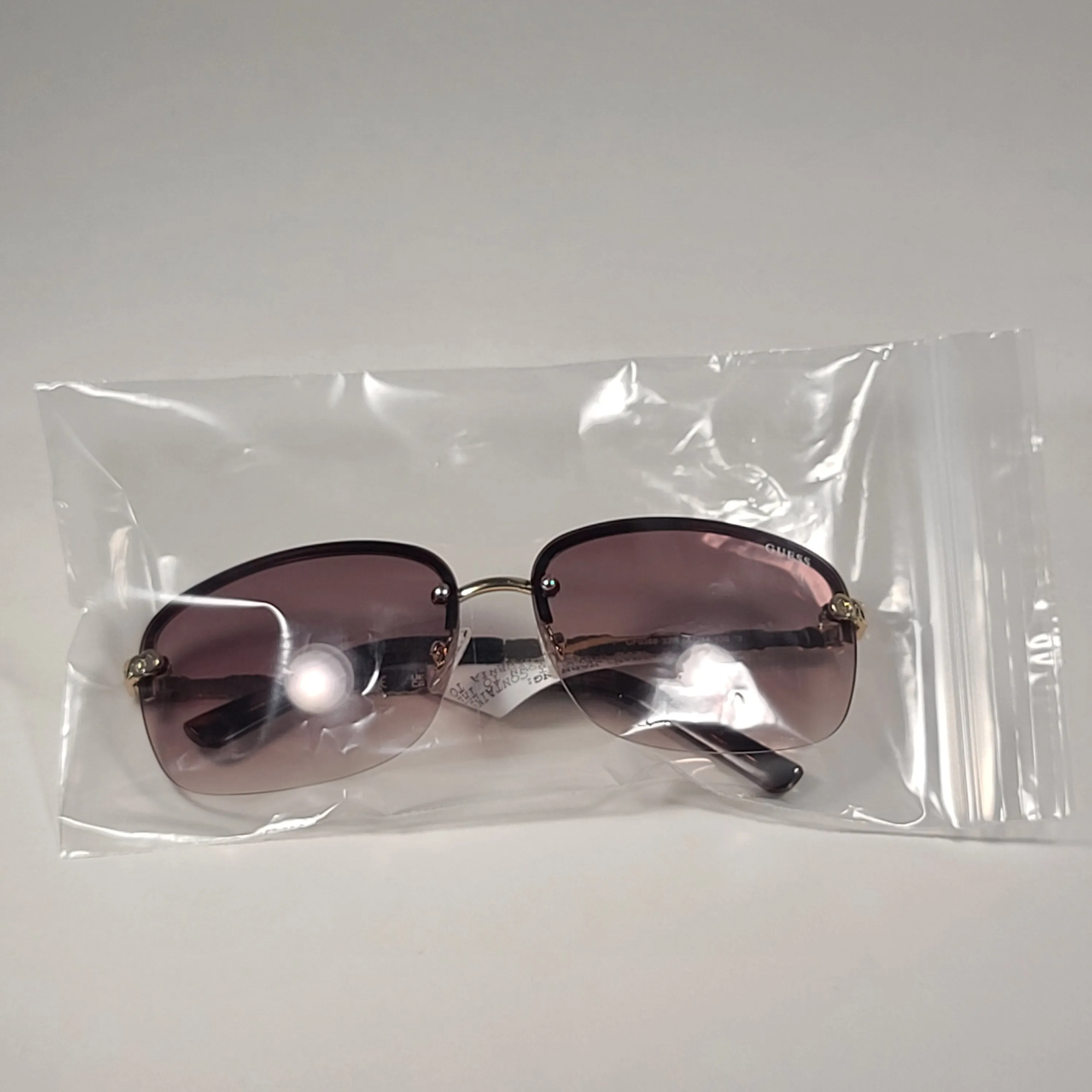 Guess Rimless Sunglasses Gold Tone  Frame Metal Brown Gradient Lens GF0388 32F