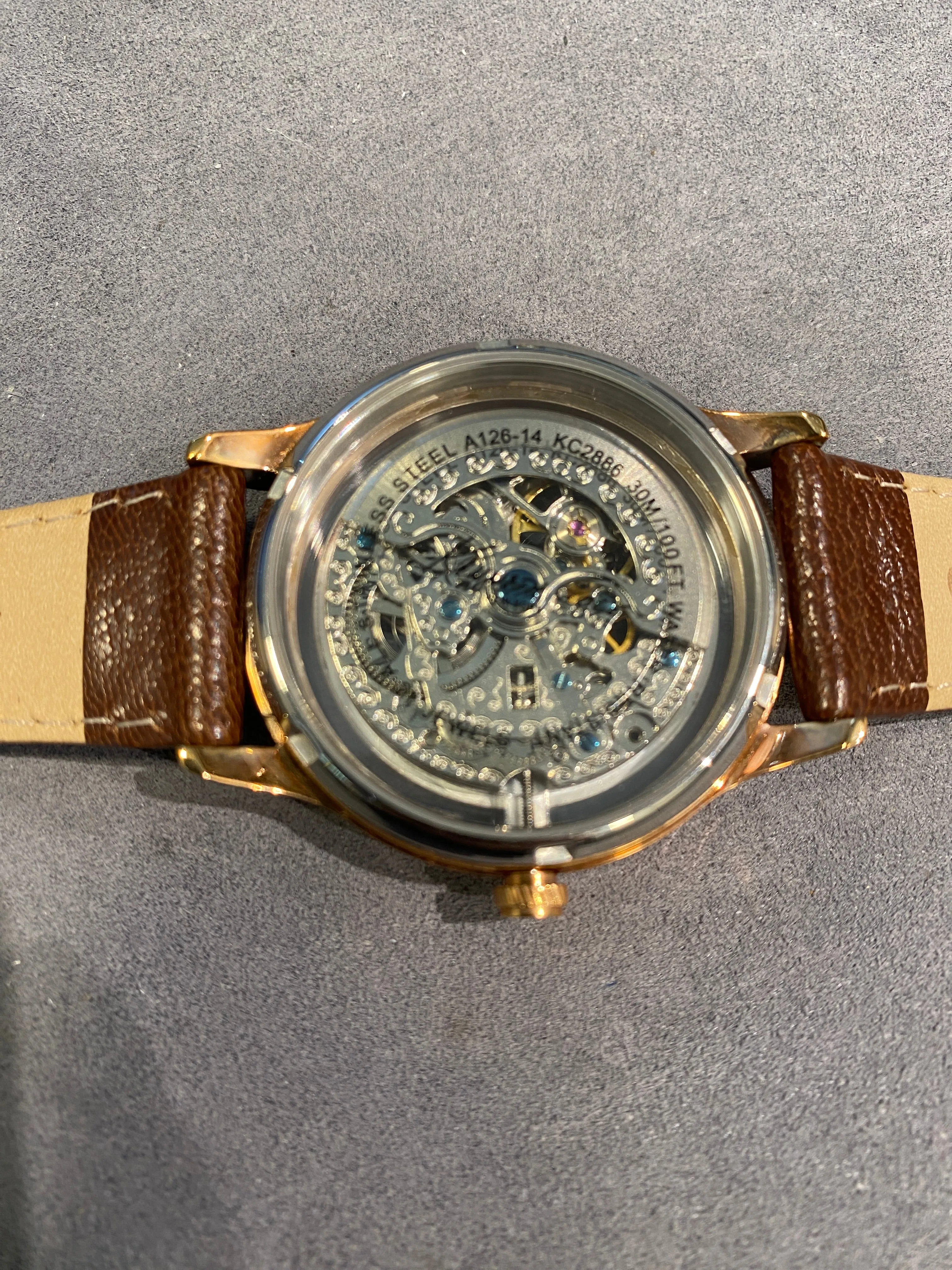 Ladies dress watch with beautiful and striking bronze skeleton dial and diamantes bezel