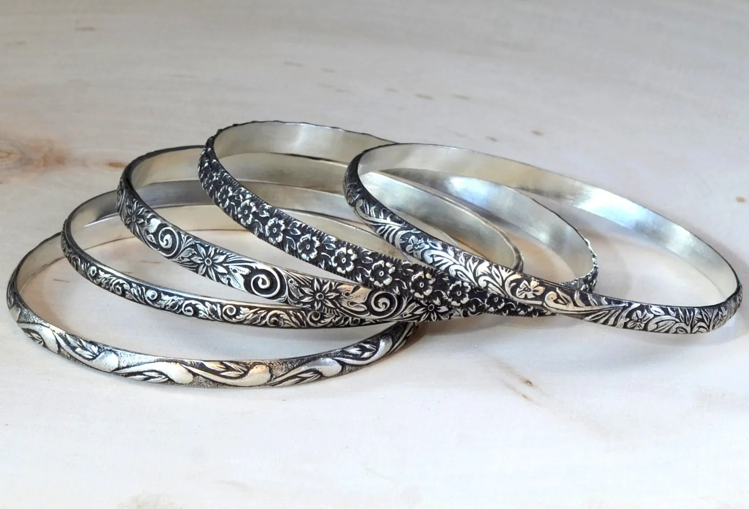 Sterling Silver Stacking Bangle Set with various Floral themes and patinas